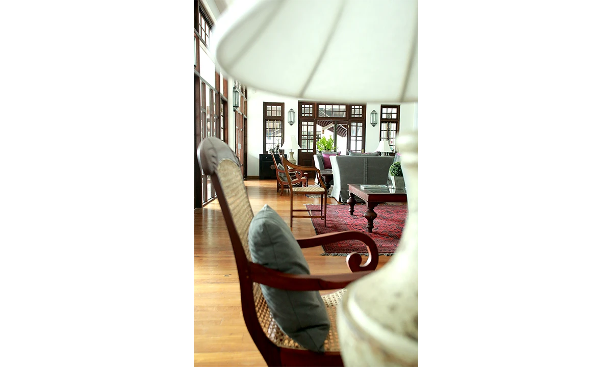 Cane chair looking through to the lounge